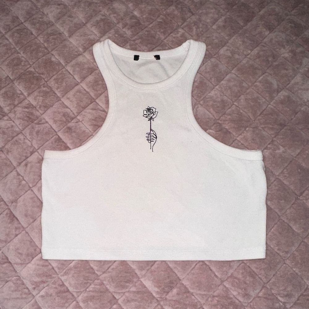Cropped white halter top with abstract rose design